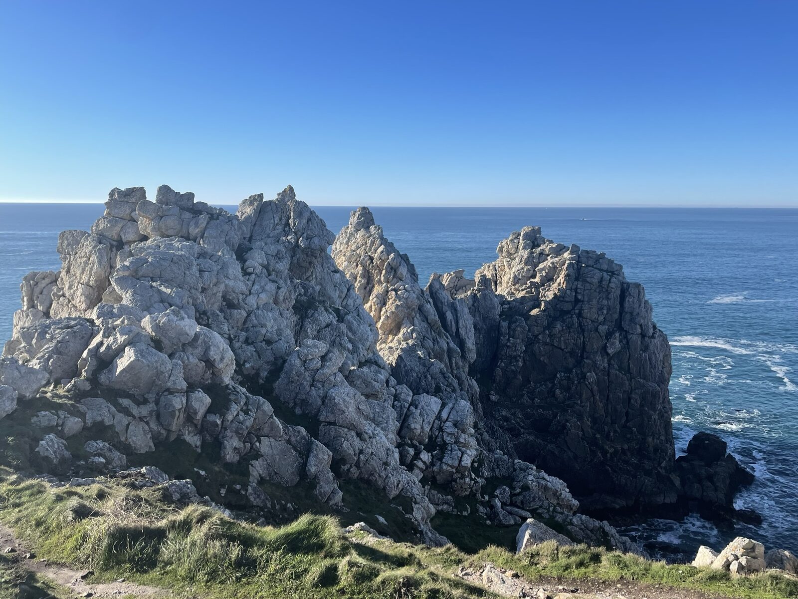 Climber on a sea cliff in Brittany